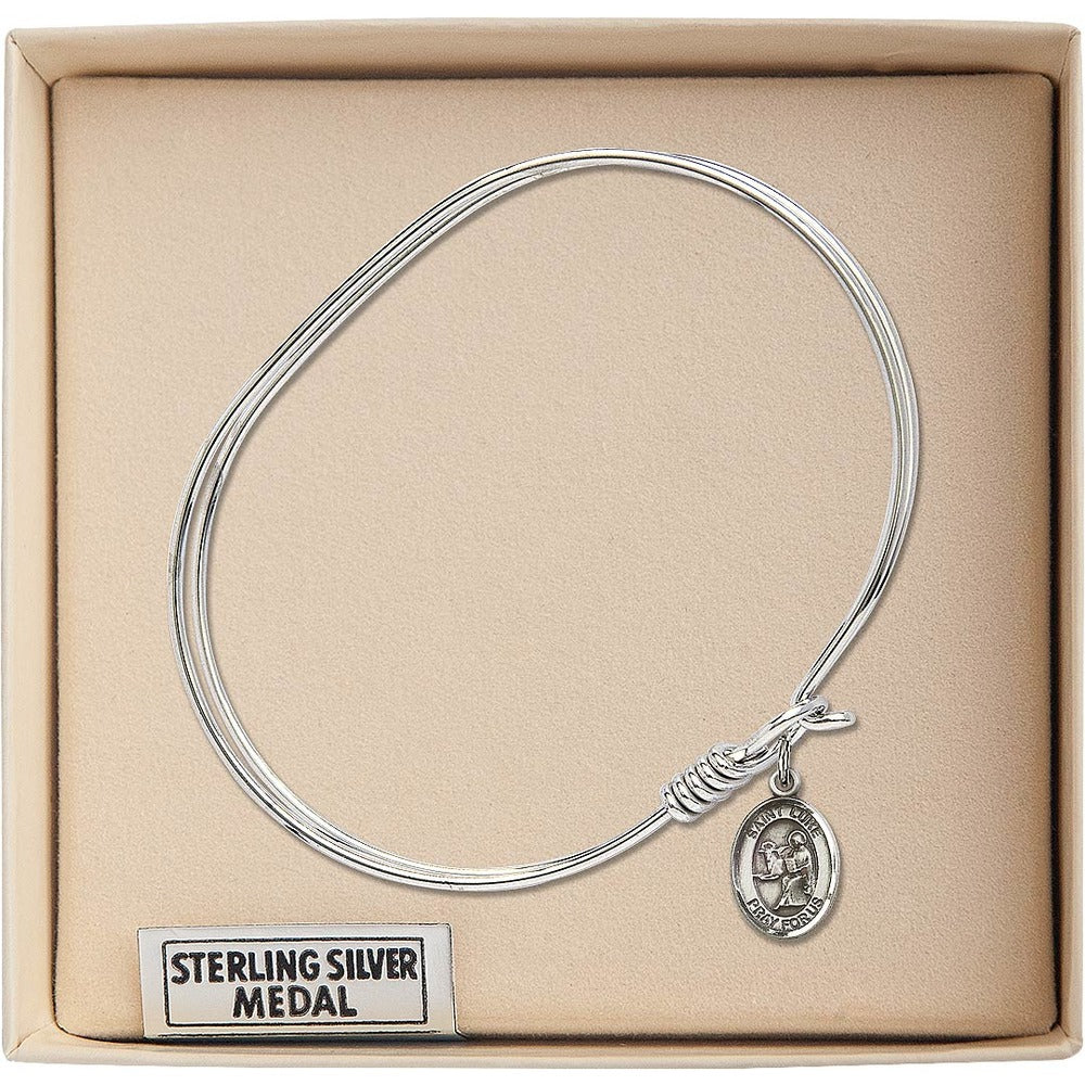 Adult 7" Oval  Rhodium Plated Bangle Bracelet with St. Luke the Apostle Medal Charm - Image 2